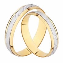 Парные свадебные кольца с крутящимся элементом из белого золота с алмазными гранями